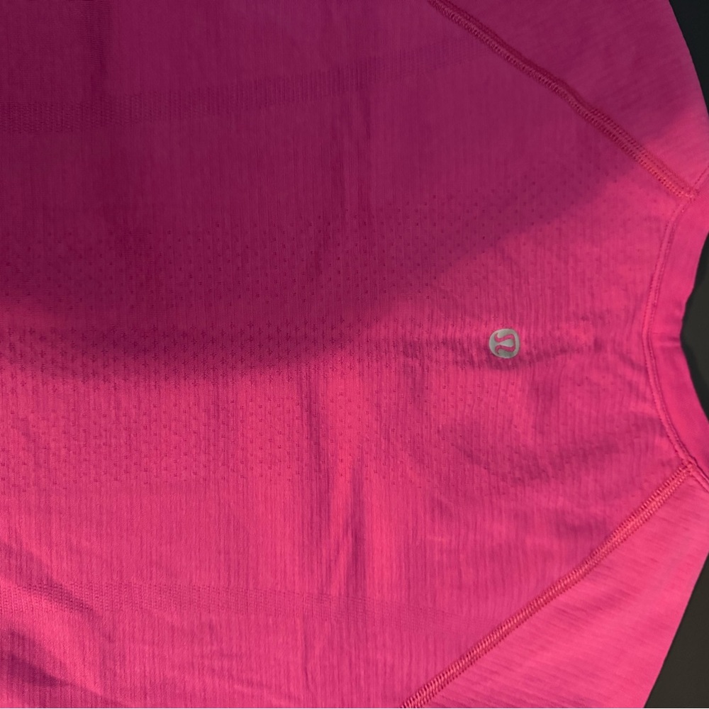 Lululemon swiftly tech tee.  Size 8 Color is a bright pink!!